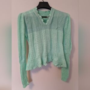 Pastel green hand knit sweater